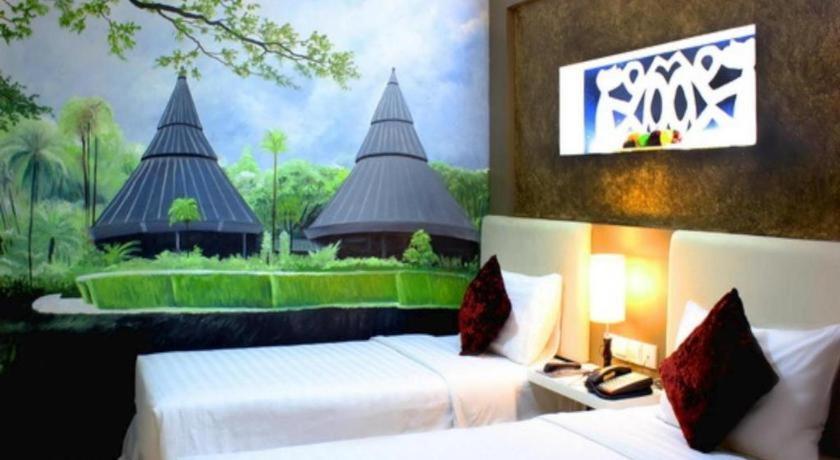 Amos Cozy Hotel Melawai Jakarta Exterior photo