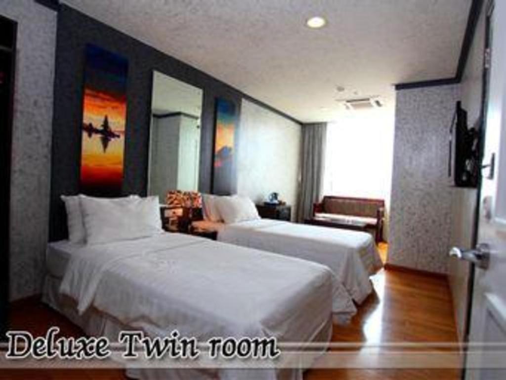 Amos Cozy Hotel Melawai Jakarta Exterior photo
