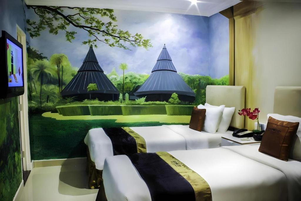 Amos Cozy Hotel Melawai Jakarta Exterior photo